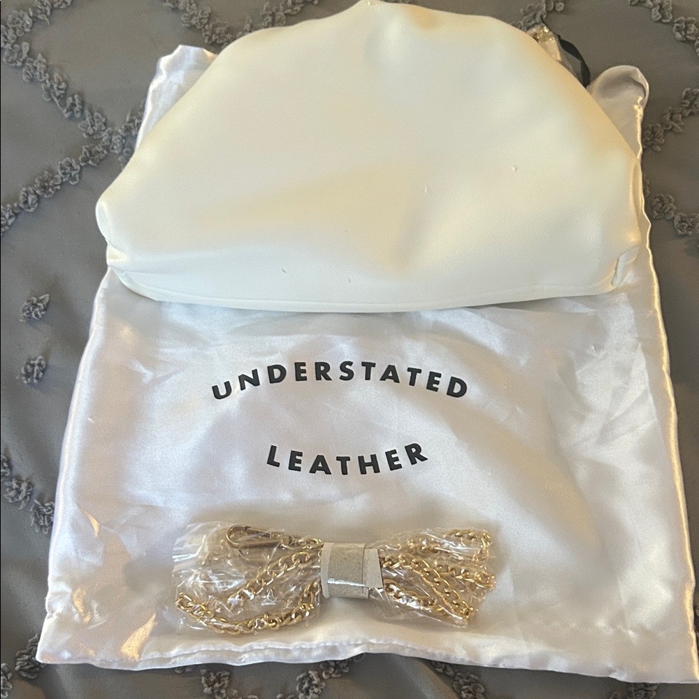 Understated Leather White Shoulder Bag with Gold Chain Strap